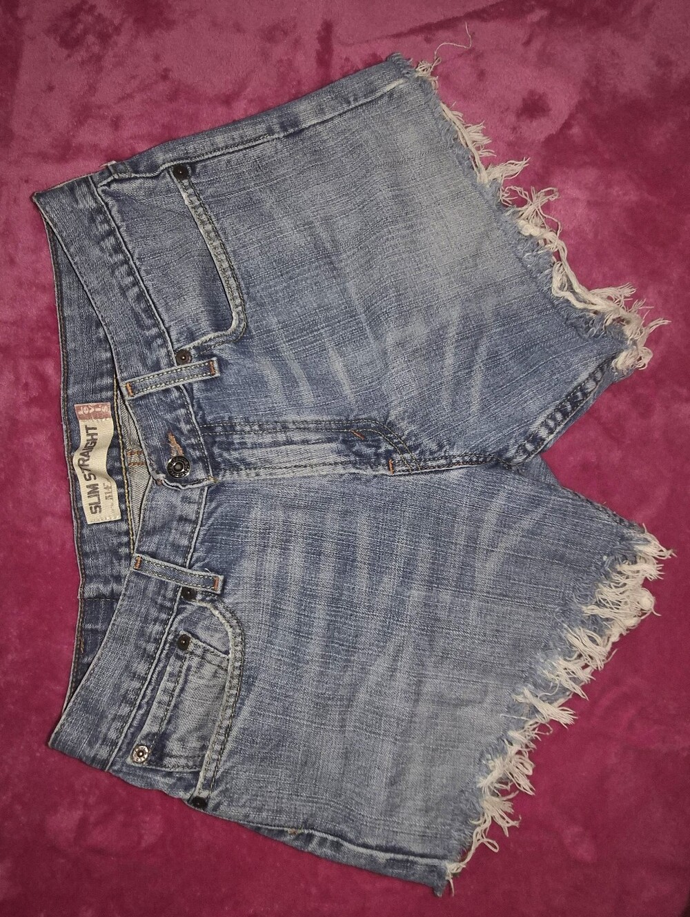 VINTAGE Levi's In Medium-Light Blue Distressed Denim Jean Cutoff Shorts